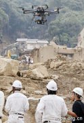 日本无人直升机深入灾区拍照 或成勘测主力